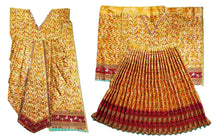 Load image into Gallery viewer, A traditional Indian ethnic wear set featuring a golden-yellow floral printed kurta with red and green borders, shown alongside a matching pleated skirt with a red and gold border.