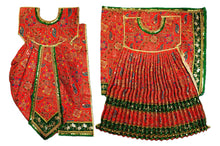 Load image into Gallery viewer, A traditional red and green embroidered Indian outfit shown as a flat lay, featuring a heavily embellished red kurta with gold and green borders, paired with a matching pleated red skirt decorated with green and gold patterned borders.